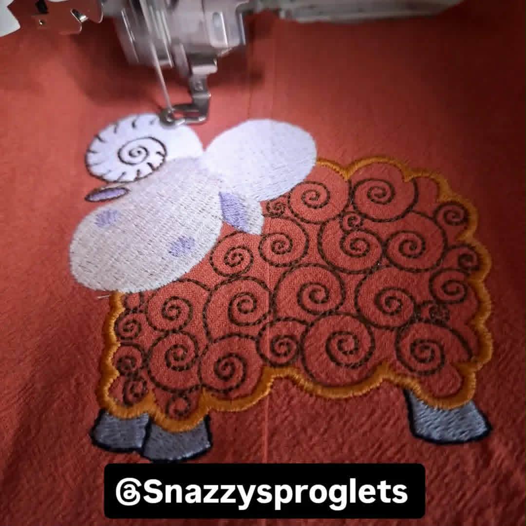 Close-up of machine embroidery on handmade children's clothing | Snazzy Sproglets