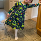 Kids green dinosaur swing dress – handmade cotton jersey | Snazzy Sproglets