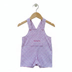 Pink and white gingham baby overalls with 'Grace' embroidered on the front pocket, shown coat hanger