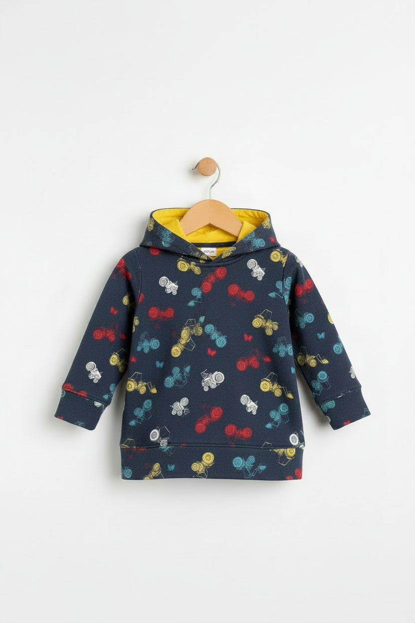 A navy blue children's hoodie with a colorful cherry and balloon print, featuring a bright yellow hood lining, hanging on a wooden hanger against a plain white background. Snazzy Sproglets