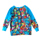 Colorful cat-patterned sweatshirt with blue sleeves on a white background