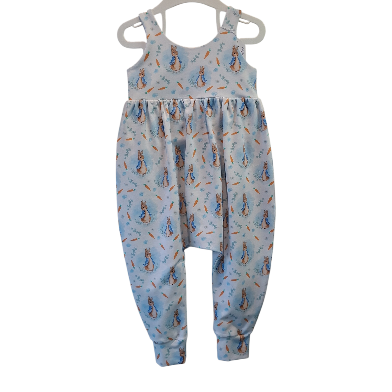 Baby romper with bunny pattern on a white background