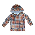 A hooded sweatshirt with a classic plaid pattern in beige, black, white, and red, featuring a kangaroo pocket and a white lining inside the hood, shown against a plain white background.