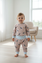 Child wearing the peach zebra set