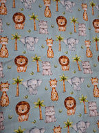 Pattern of cartoon animals on a mint green background