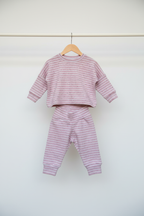 Pink-and-white set on a coat hanger