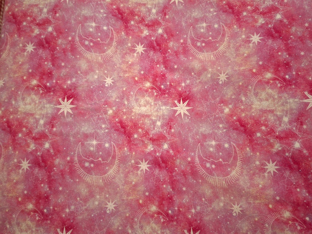 Pattern of celestial designs on a pink and white gradient background