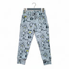 Light blue jogger pants with an all-over cartoon robot print, featuring a matching elastic waistband and cuffed ankles.