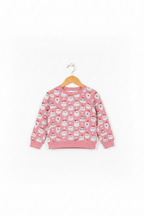 A pink long-sleeve crewneck sweatshirt with an all-over snowman pattern, hanging on a wooden hanger against a plain white background. Snazzy Sproglets