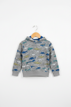 A children's gray hooded sweatshirt with an allover shark print in blue, yellow, and white, hanging on a wooden hanger against a plain white background.